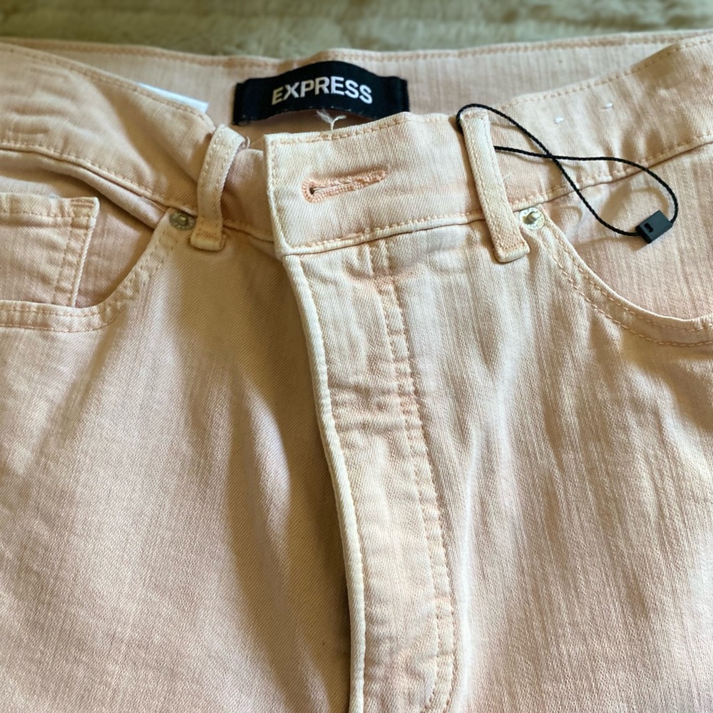 Express- light pink cropped leg denim with frayed leg size 12